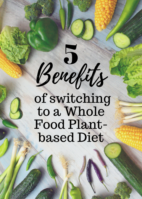 vegetables on a wooden background surrounding text that says "5 benefits of switching to a whole food plant-based diet"