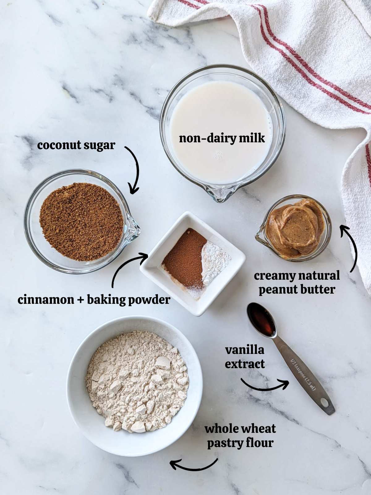 Ingredients for this snickerdoodle mug cake measured out and placed in individual bowls and spoons.