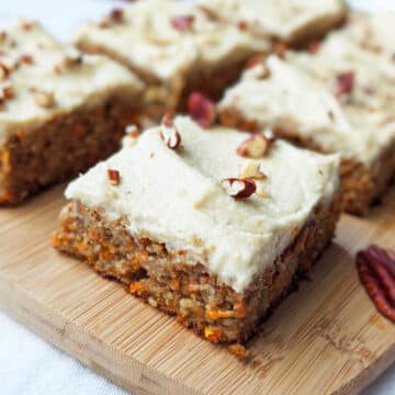 The ultimate healthy vegan carrot cake recipe that's perfect to whip up for Easter or anytime this spring. It's also gluten free, sugar free, oil free, and dairy free, but you wouldn't know it! Top it with the creamy cashew frosting and indulge in this guilt-free treat! #carrotcake #vegancake #plantbased #veganrecipe #vegancarrotcake #plantbasedcake #healthydessert #glutenfreedessert #sugarfreedessert #dessertrecipe #easter #easterrecipe
