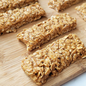 Just 5 ingredients and 5 minutes to whip these up. These bars are so easy to make, you'll never buy store-bought granola bars again. They are very filling, boasting 9g of protein using only whole food ingredients, and are vegan and gluten free! #granolabar #vegansnack #easysnack #vegan #glutenfree #healthysnack