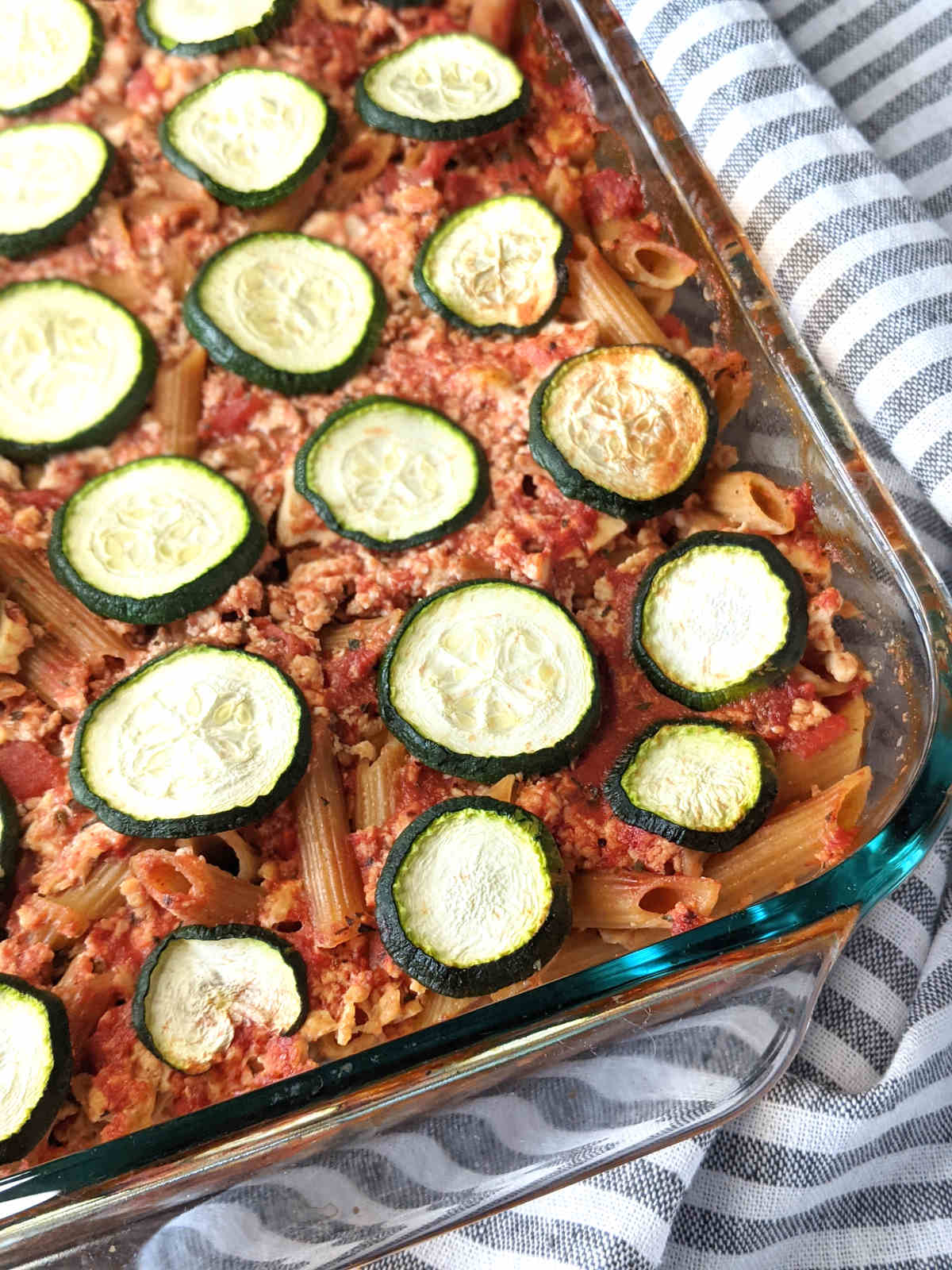 Baked vegan pasta in a casserole dish.