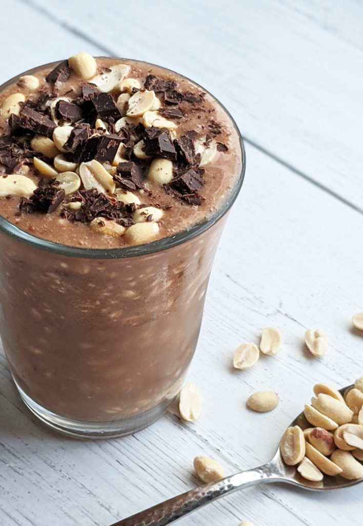 Healthy Vegan Snickers Overnight Oats are going to have you wondering if you're eating breakfast or dessert. They're filling, delicious, high protein, and taste like candy! They're also gluten-free and sugar-free. #snickers #overnightoats #veganbreakfast #postworkoutsnack 