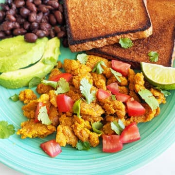chickpea flour scramble with chopped tomatoes and cilantro