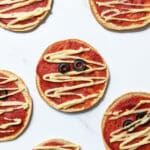 Mini Vegan Halloween Pizzas designed to look like mummies