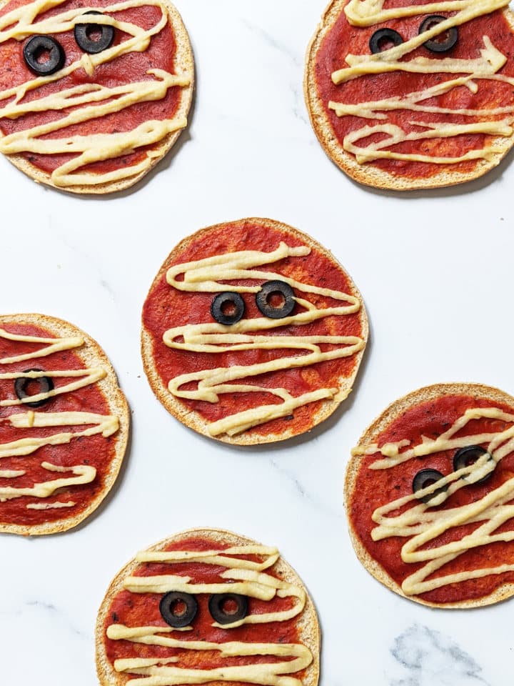 Mini Vegan Halloween Pizzas designed to look like mummies