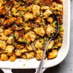 Vegan stuffing made on the stove top served in a casserole dish.