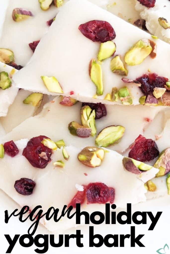 This holiday yogurt bark is an easy and delicious cold treat. Make it festive by adding chopped pistachios and dried cranberries. It's so simple to make that it's perfect as a last minute holiday party treat. You may already have all the ingredients on hand! Vegan holiday yogurt bark | christmas bark | vegan bark | dairy free bark recipe | dairy free dessert | vegan christmas dessert #yogurtbark