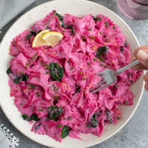 pink beet pasta in a bowl