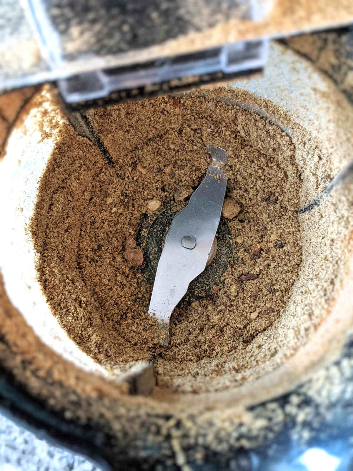 Ground up pickling spice in a grinder.