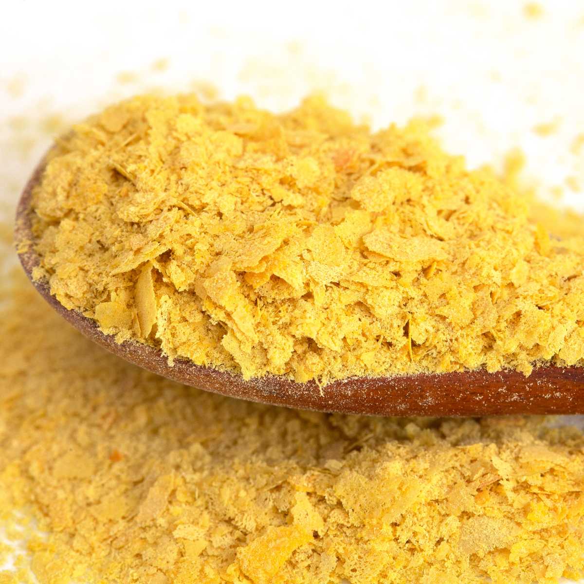 Nutritional yeast on a spoon.