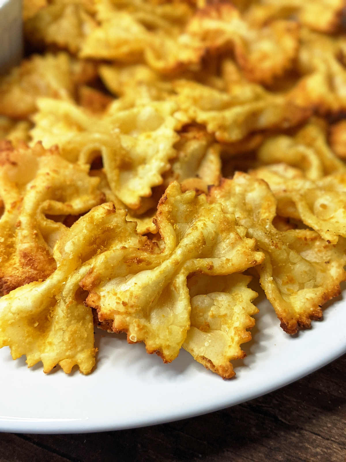 Pasta chips piled on a serving plate.