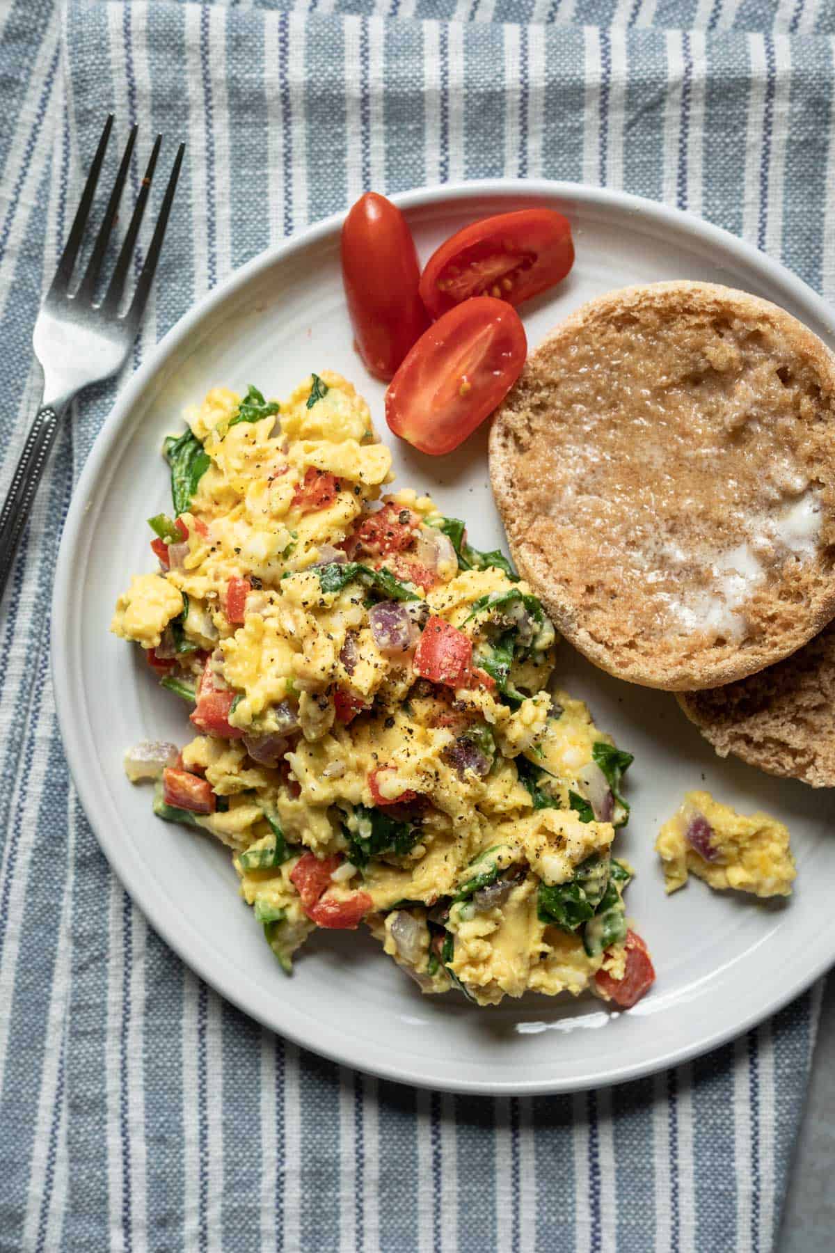 Just Egg scramble on a plate served with toast.