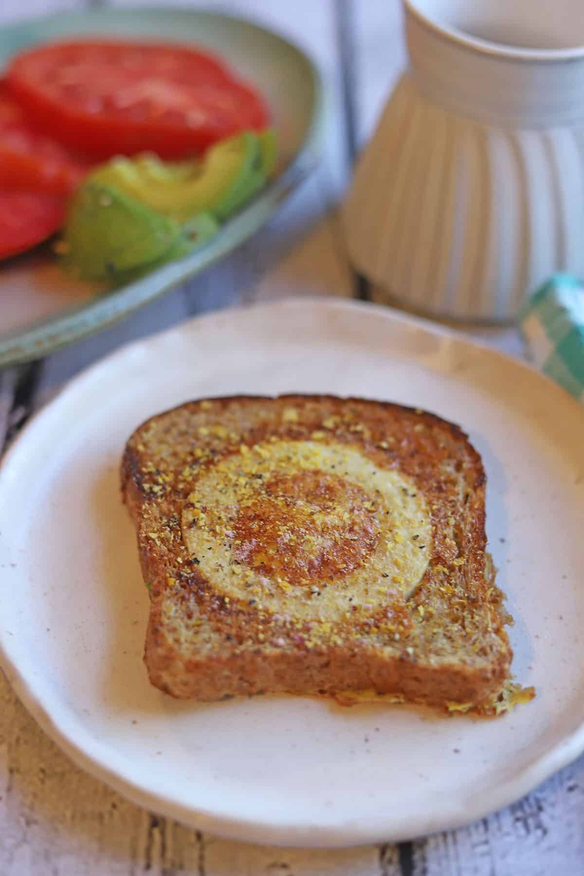 Vegan egg toast on a plate.