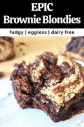 Slice of brownie blondie with a bite missing with text overlay "Epic Brownie Blondies, fudgy, eggless, dairy free."
