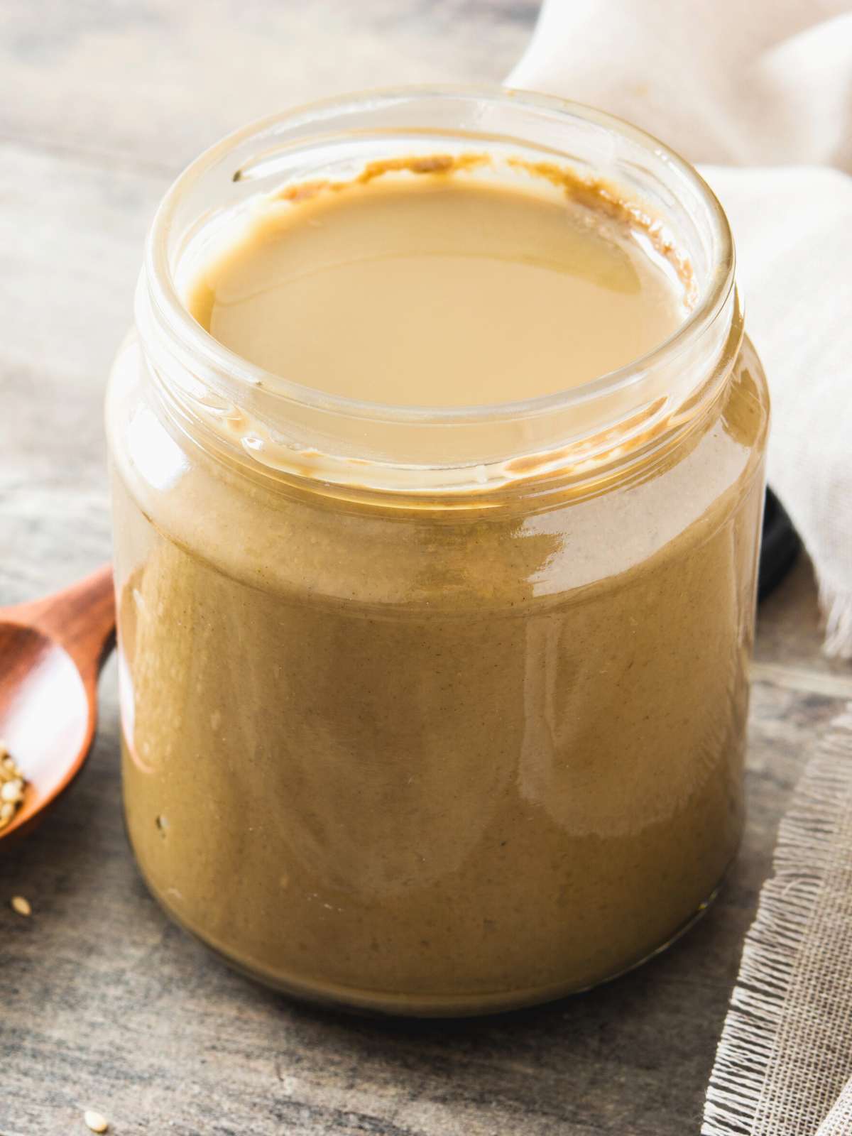 Glass jar of tahini.