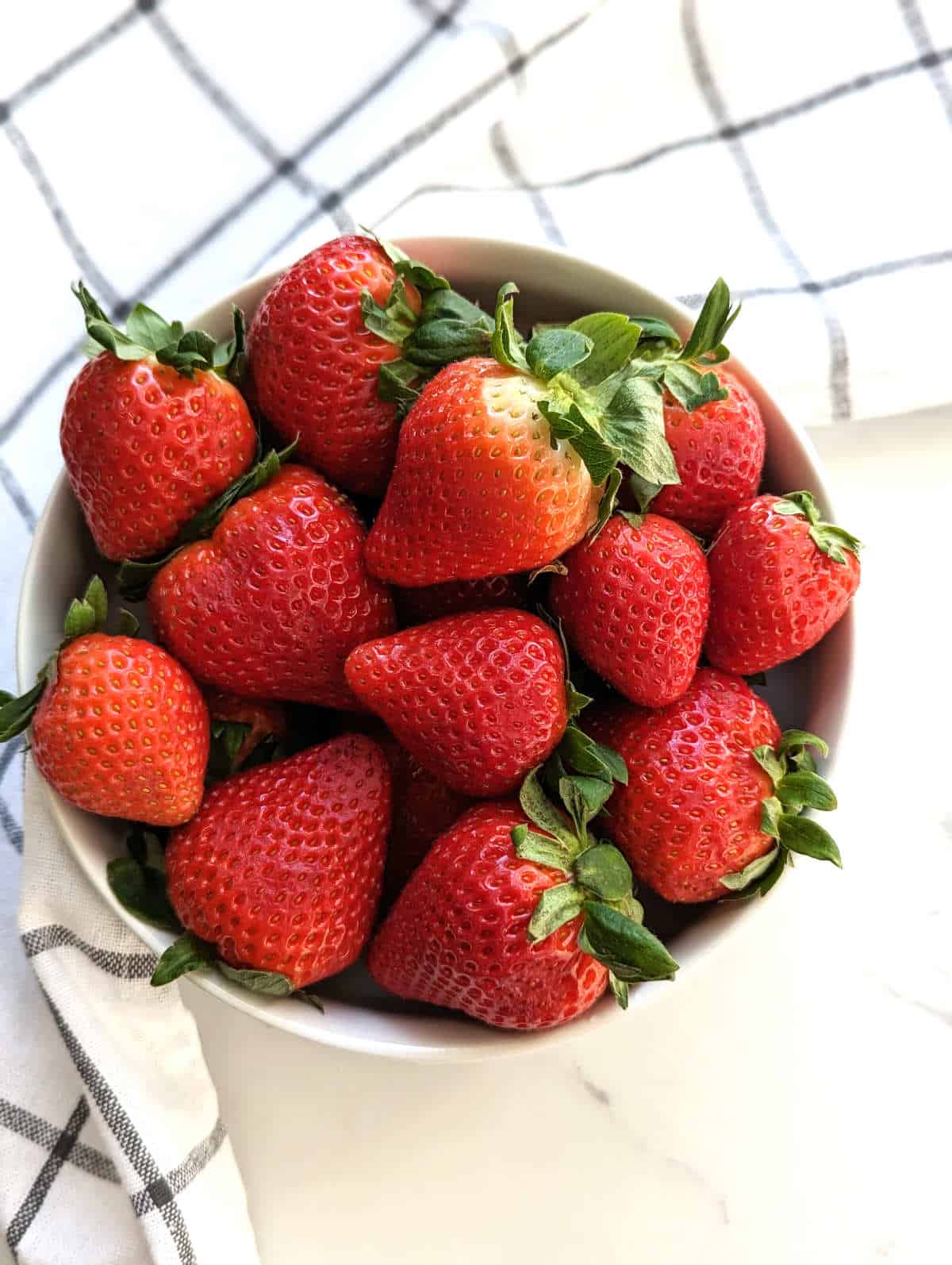 Fresh strawberries in a bowl.