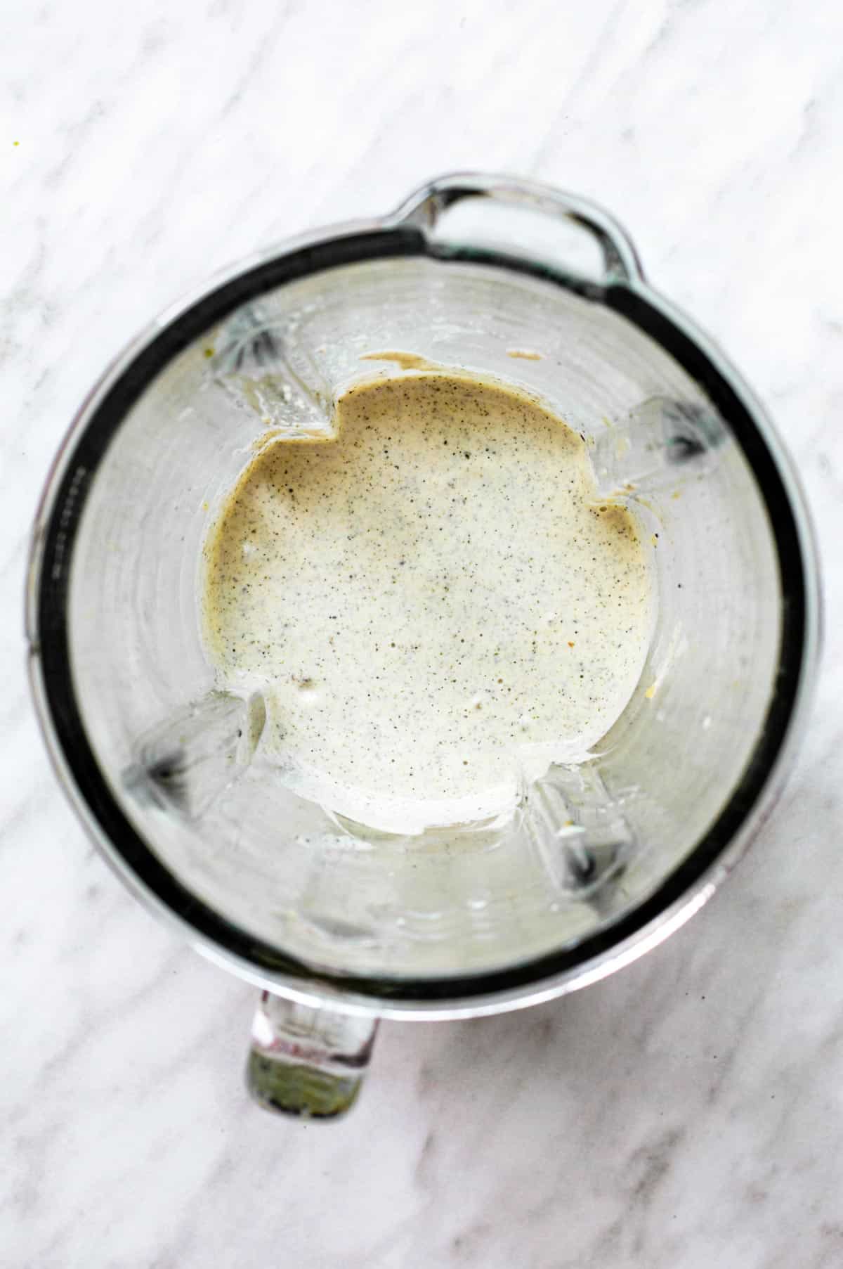 Creamy hemp aioli in a blender.