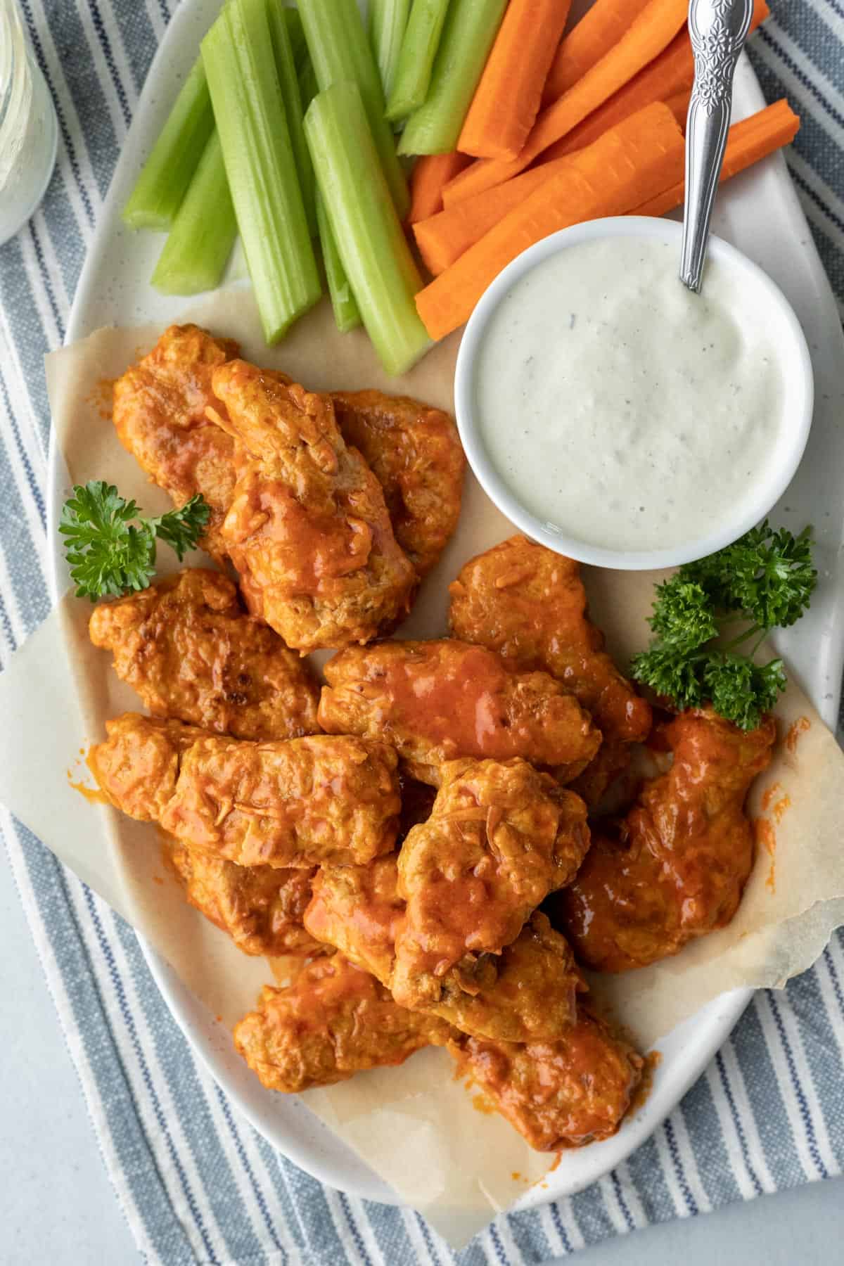 Vegan chicken wings on a platter.