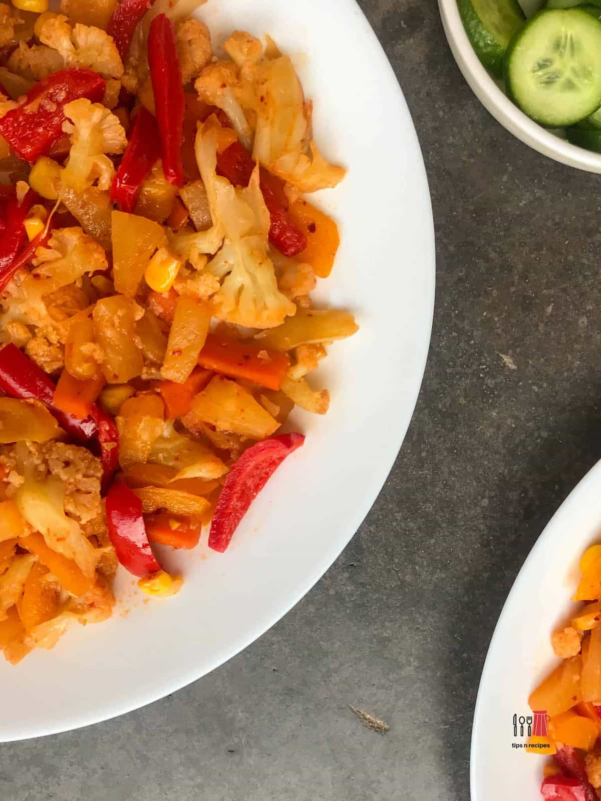 Steamed stir fry veggies on a plate.