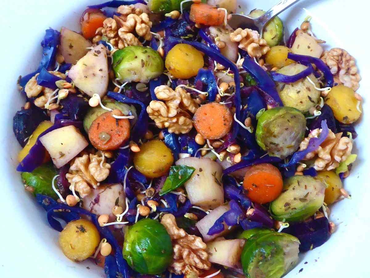 A bowl of vegan hash with sprouted lentils.