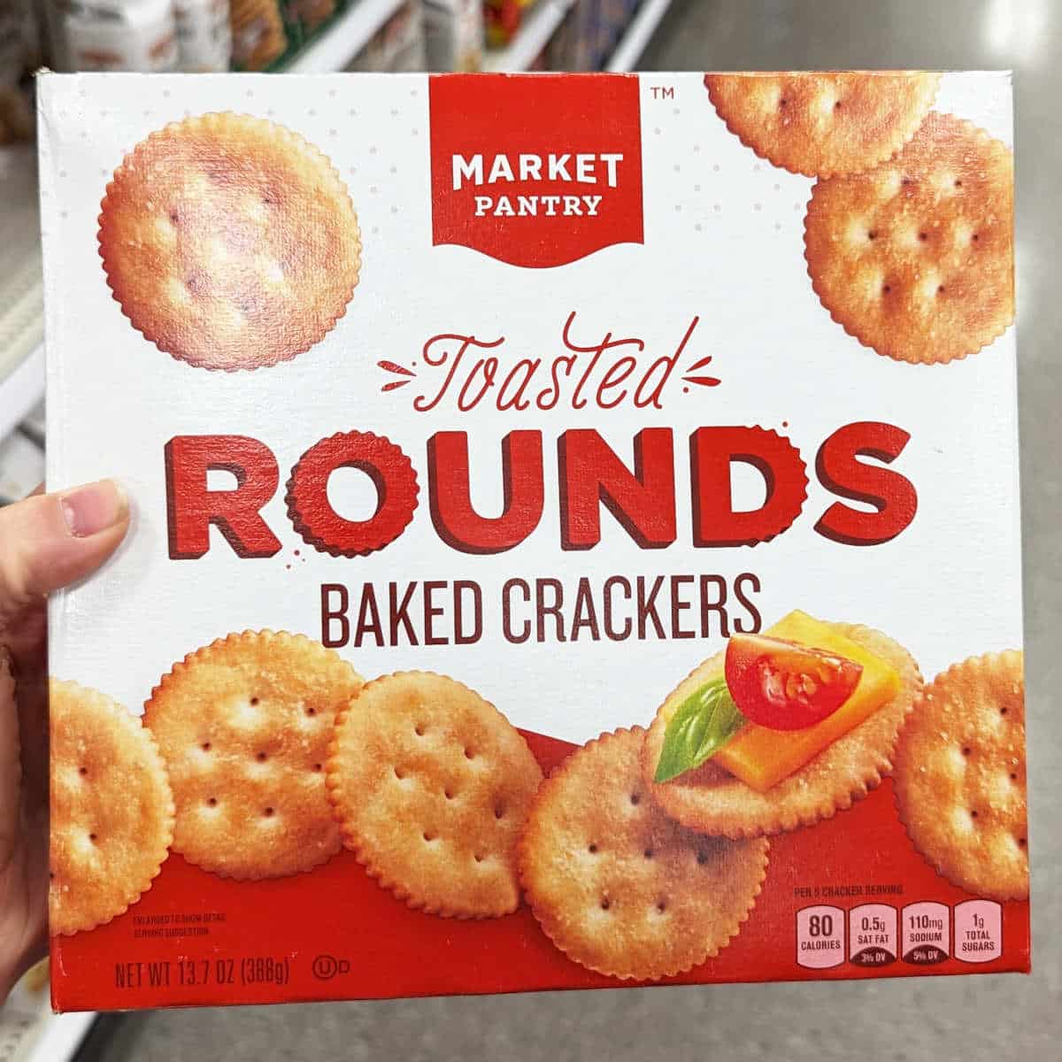 A package of Market Pantry Toasted Rounds buttery crackers.