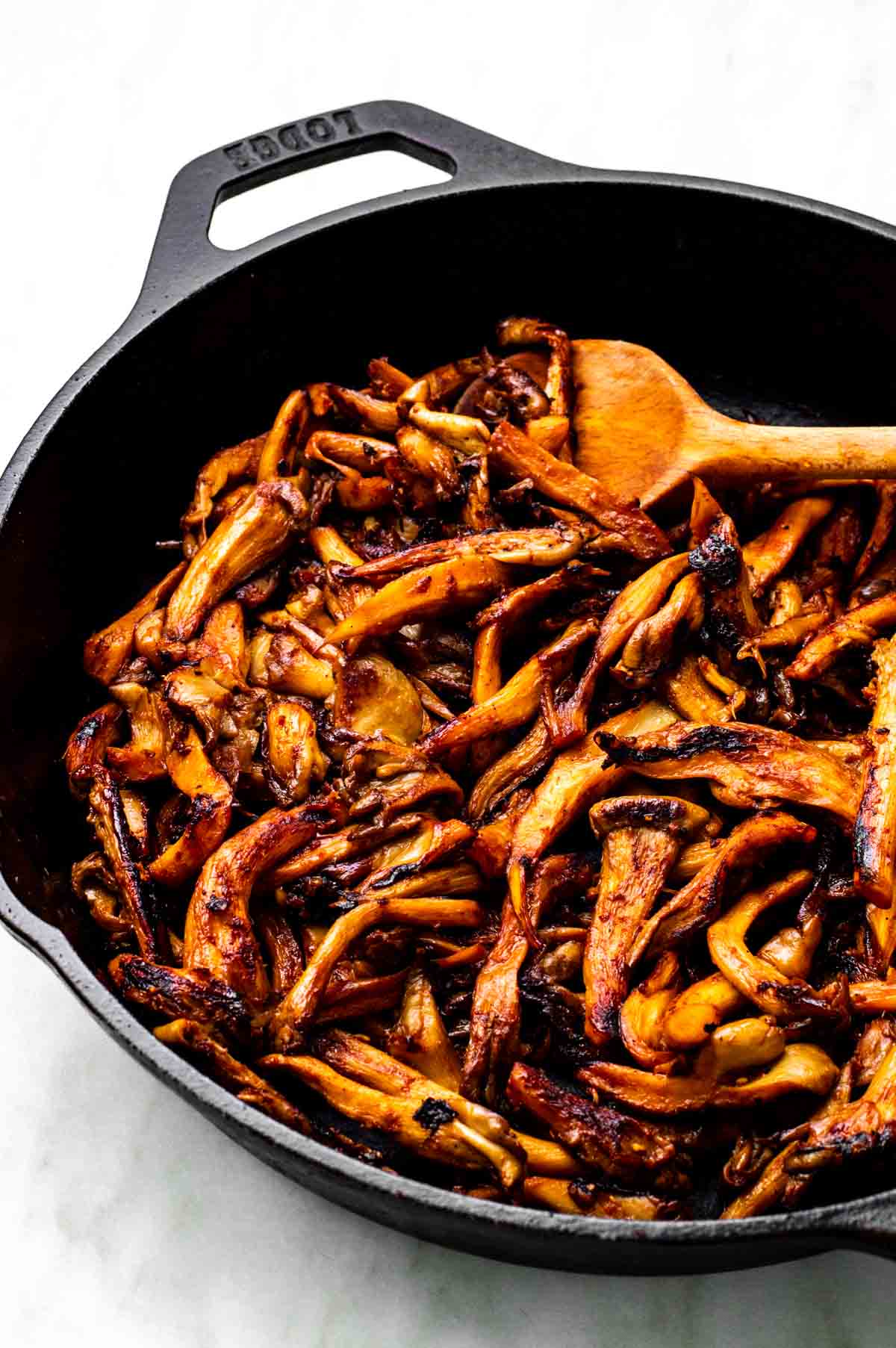 The caramelized mushrooms in a skillet.