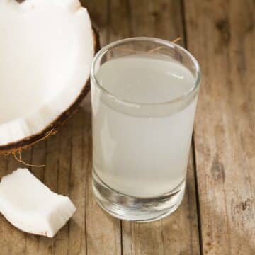 A glass of homemade coconut water.