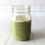 Matcha tea in a glass jar.