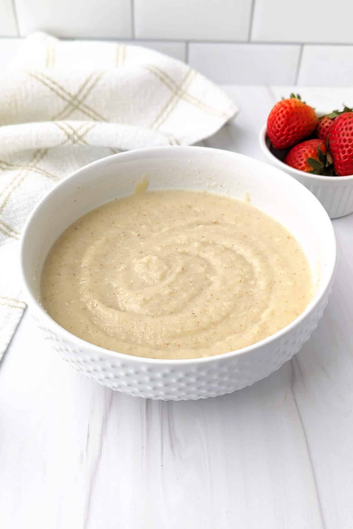 Vegan cream of wheat in a microwave-safe bowl after cooking.