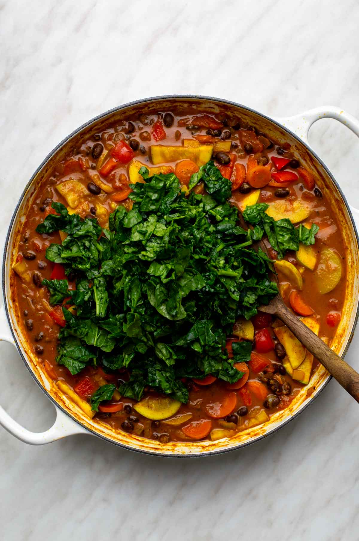 Black bean curry served with fresh cilantro on top.